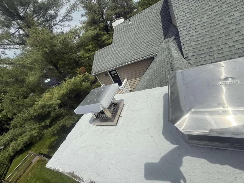 Aerial view of a completed chimney cap installation