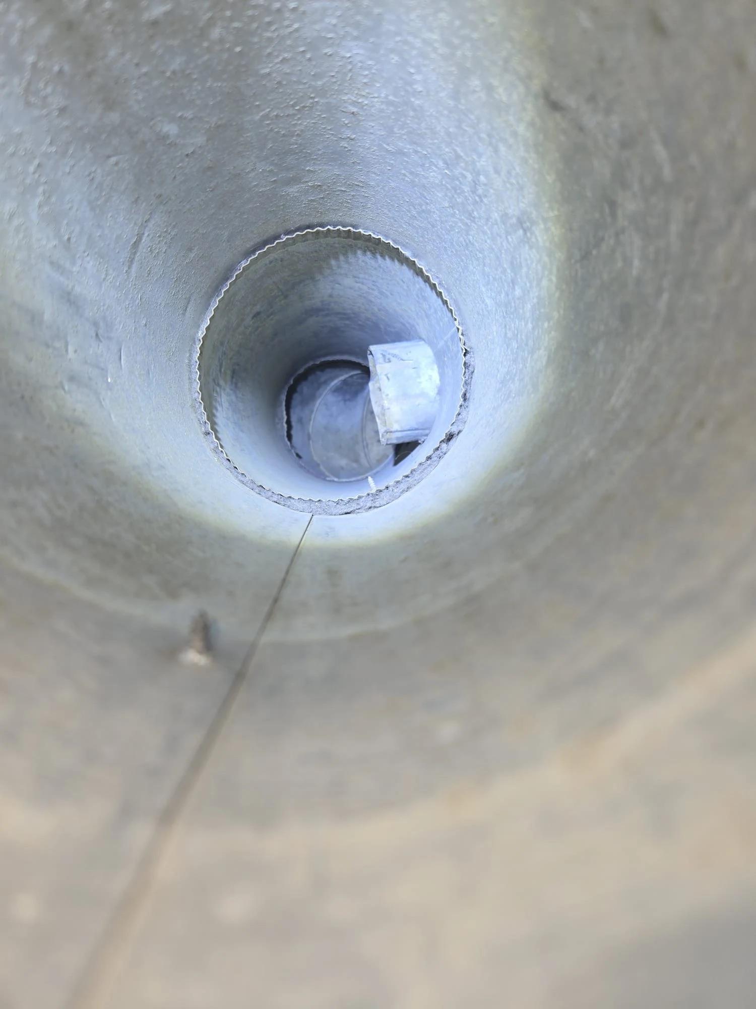Close-up of a newly installed chimney flue liner